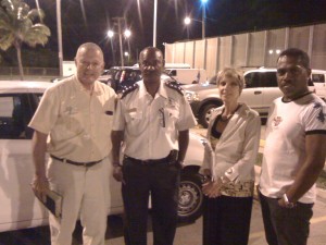 Outside the mens prison with the warden and friend Tavida